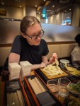 Kyle eating udon at Tokyo Station