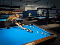 Kyle playing pool in Sun City West, AZ