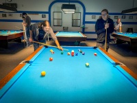 Paul and Kyle playing pool in Sun City West, AZ